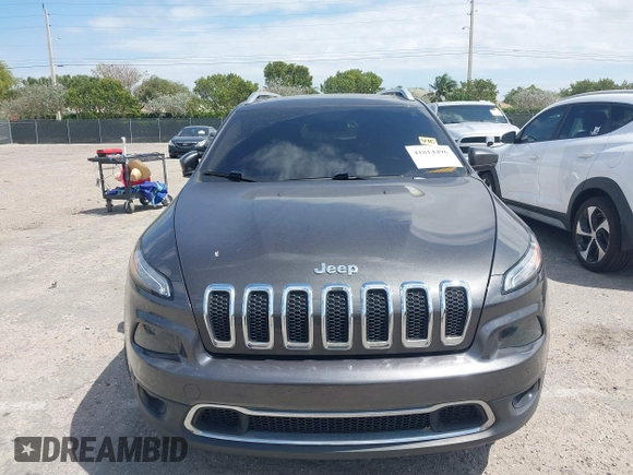 2014 Jeep Cherokee Limited with VIN 1C4PJLDBXEW183095, listed as a IAAI auction lot 41814496 with 89,589 mi miles and . Bid and sale history available at DreamBid. Image 12.