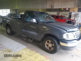 2002 Ford F-150 XL with VIN 1FTRF17W72NA55539, listed as a Copart auction lot 82529424 with 181,747 mi miles and Salvage Title. Bid and sale history available at carsss.com. Image 4.