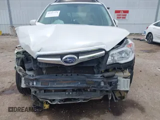 2014 Subaru Forester XT Touring with VIN JF2SJGMC4EH555465, listed as a IAAI auction lot 42357371 with 168,378 mi miles and . Bid and sale history available at DreamBid. Image 13.