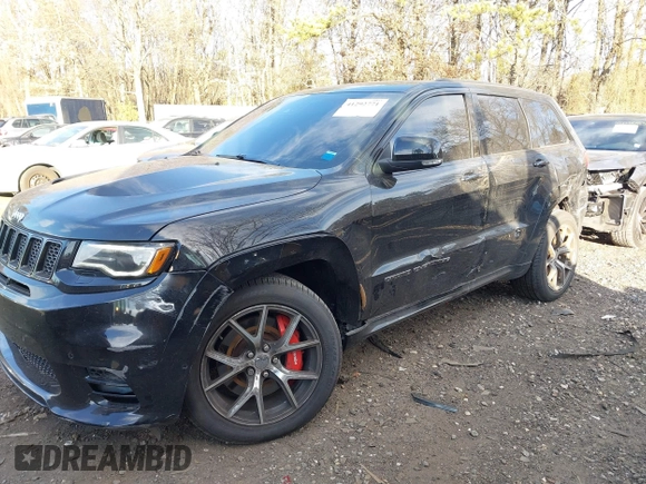 2017 Jeep Grand Cherokee SRT with VIN 1C4RJFDJ3HC694736, listed as a IAAI auction lot 41292771 with 79,966 mi miles. Bid and sale history available at carsss.com. Image 6.