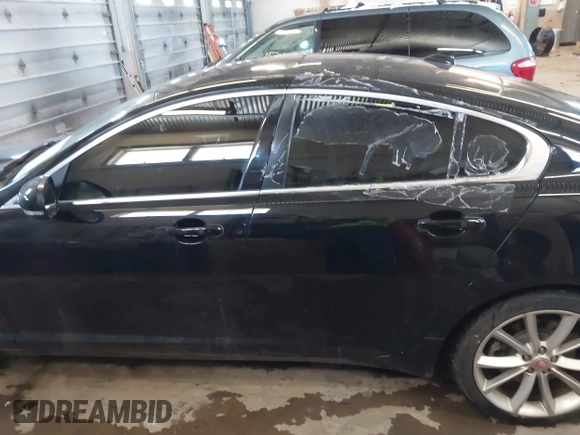 2015 Jaguar XF V6 Portfolio with VIN SAJWJ0FF5F8U57756, listed as a IAAI auction lot 41631278 with 47,158 mi miles. Bid and sale history available at carsss.com. Image 14.