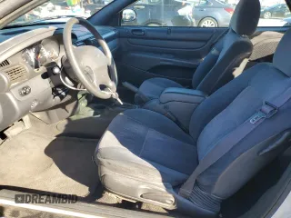 2004 Chrysler Sebring LX with VIN 1C3EL45X74N327583, listed as a Copart auction lot 82833194 with 114,804 mi miles and Salvage Title. Bid and sale history available at DreamBid. Image 7.