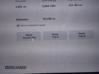 2017 Tesla Model X 90D with VIN 5YJXCDE23HF051321, listed as a IAAI auction lot 41415384 with 127,476 mi miles and . Bid and sale history available at carsss.com. Image 14.