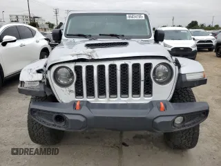 2023 Jeep Gladiator Mojave z VIN 1C6JJTEG9PL587727, wystawiony jako Copart lot #66034185 z przebiegiem 28 776 mil mil oraz Szkoda całkowita • Salvage title. Historia ofert i sprzedaży dostępna na DreamBid. Obrazek 5.