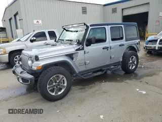 2019 Jeep Wrangler Unlimited Sahara with VIN 1C4HJXEG4KW655423, listed as a Copart auction lot 59796055 with 47,722 mi miles and Salvage title. Bid and sale history available at DreamBid. Image 1.