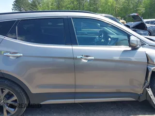 2017 Hyundai Santa Fe Ultimate z VIN 5NMZW4LA7HH047989, wystawiony jako IAAI lot #42051500 z przebiegiem 75 747 mil mil oraz . Historia ofert i sprzedaży dostępna na DreamBid. Obrazek 13.