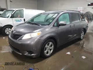 2011 Toyota Sienna LE AAS with VIN 5TDKK3DC5BS035187, listed as a Copart auction lot 56357725 with 176,529 mi miles and Salvage title. Bid and sale history available at DreamBid. Image 1.