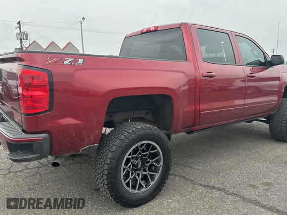 2018 Chevrolet Silverado 1500 LT with VIN 3GCUKREC0JG399301, listed as a Copart auction lot 53949965 with 164,299 mi miles and Clean Title. Bid and sale history available at carsss.com. Image 4.