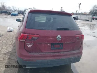 2018 Volkswagen Tiguan S with VIN 3VV1B7AX9JM085312, listed as a IAAI auction lot 41656827 with 122,322 mi miles and . Bid and sale history available at DreamBid. Image 16.