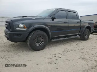 2016 Ram 1500 Rebel z VIN 1C6RR7YT3GS406493, wystawiony jako Copart lot #52188575 z przebiegiem 99 911 mil mil oraz Tytuł czysty. Historia ofert i sprzedaży dostępna na DreamBid. Obrazek 1.