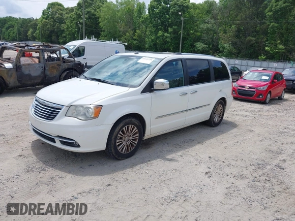 2011 Chrysler Town & Country Limited with VIN 2A4RR6DG8BR714484, listed as a IAAI auction lot 42155728 with 181,162 mi miles. Bid and sale history available at carsss.com. Image 2.