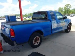 1999 Ford F-150 XL with VIN 1FTRX17L9XNB83680, listed as a IAAI auction lot 42636807 with Not provided miles and . Bid and sale history available at DreamBid. Image 4.