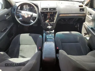 2007 Mercury Milan with VIN 3MEHM07Z27R620031, listed as a Copart auction lot 56409715 with 197,418 mi miles and Salvage title. Bid and sale history available at DreamBid. Image 8.