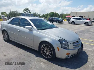 2006 Cadillac CTS z VIN 1G6DP577260194541, wystawiony jako IAAI lot #42289951 z przebiegiem 97 850 mil mil oraz . Historia ofert i sprzedaży dostępna na DreamBid. Obrazek 1.