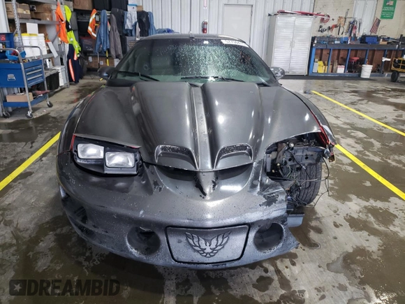 1999 Pontiac Firebird Formula с VIN 2G2FV22G1X2211237, выставлен на аукционе Copart как лот 57750415 с пробегом 134 236 миль миль и Списание • Salvage title. История ставок и продаж доступна на DreamBid. Изображение 5.