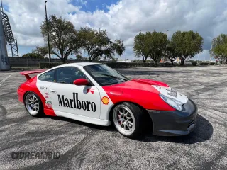 2004 Porsche 911 z VIN WP0AC299X4S692464, wystawiony jako Copart lot #50950705 z przebiegiem 44 494 mil mil oraz Czysty tytuł • Clean title. Historia ofert i sprzedaży dostępna na DreamBid. Obrazek 3.