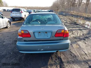 1999 Honda Civic EX with VIN 2HGEJ8643XH511334, listed as a IAAI auction lot 41851364 with 142,632 mi miles. Bid and sale history available at carsss.com. Image 16.
