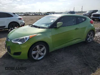 2012 Hyundai Veloster w/Gray Int z VIN KMHTC6AD1CU066882, wystawiony jako Copart lot #55781745 z przebiegiem 167 427 mil mil oraz Czysty tytuł • Clean title. Historia ofert i sprzedaży dostępna na DreamBid. Obrazek 1.