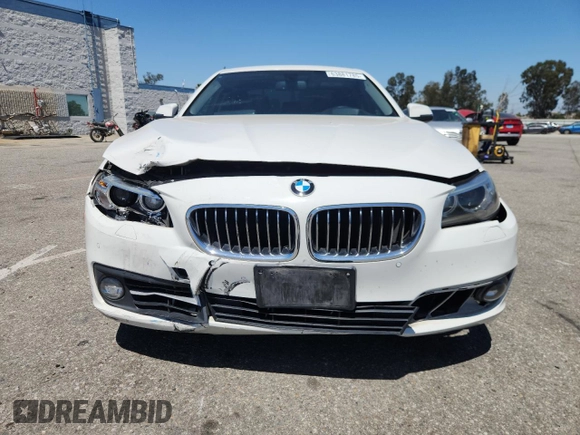 2015 BMW 5 Series 528i with VIN WBA5A5C59FD518341, listed as a Copart auction lot 63881785 with 147,489 mi miles and Salvage title. Bid and sale history available at DreamBid. Image 5.