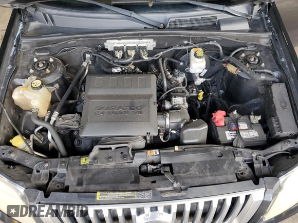 2010 Mercury Mariner Premier with VIN 4M2CN9HG3AKJ25675, listed as a Copart auction lot 64546635 with 99,620 mi miles and Salvage title. Bid and sale history available at DreamBid. Image 12.