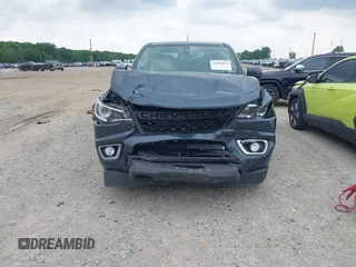 2019 Chevrolet Colorado 4WD Z71 with VIN 1GCGTDEN5K1328061, listed as a IAAI auction lot 42505934 with 76,520 mi miles and . Bid and sale history available at DreamBid. Image 12.