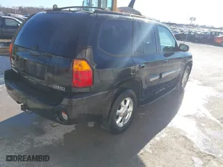 2005 GMC Envoy SLE with VIN 1GKDT13S952288760, listed as a IAAI auction lot 41671656 with 1 mi miles. Bid and sale history available at carsss.com. Image 4.