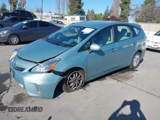 2014 Toyota Prius Two with VIN JTDZN3EUXEJ010235, listed as a IAAI auction lot 41859160 with 104,410 mi miles and . Bid and sale history available at DreamBid. Image 2.