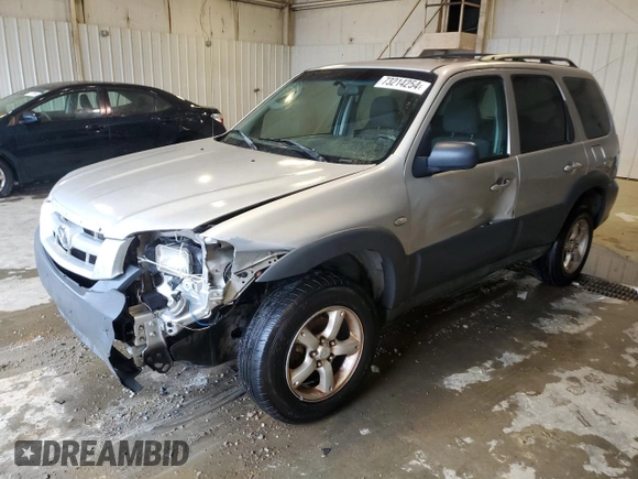 2006 Mazda Tribute i with VIN 4F2YZ02Z86KM02172, listed as a Copart auction lot 73214254 with 317,446 mi miles and Salvage Title. Bid and sale history available at DreamBid. Image 1.
