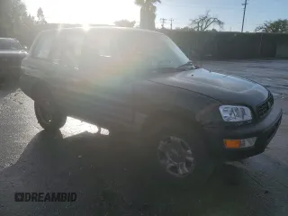 1999 Toyota RAV4 with VIN JT3GP10V5X7060132, listed as a Copart auction lot 48188975 with 226,460 mi miles and Clean Title. Bid and sale history available at DreamBid. Image 4.