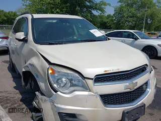 2015 Chevrolet Equinox LT z VIN 1GNALBEK9FZ115113, wystawiony jako IAAI lot #42402174 z przebiegiem 146 666 mil mil oraz . Historia ofert i sprzedaży dostępna na DreamBid. Obrazek 1.