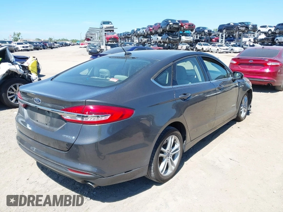 2018 Ford Fusion Hybrid S with VIN 3FA6P0UU3JR122443, listed as a IAAI auction lot 41898129 with 119,873 mi miles. Bid and sale history available at carsss.com. Image 4.