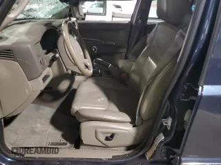 2010 Jeep Commander Sport with VIN 1J4RG4GT7AC113206, listed as a Copart auction lot 56103825 with 174,306 mi miles and Salvage title. Bid and sale history available at DreamBid. Image 7.