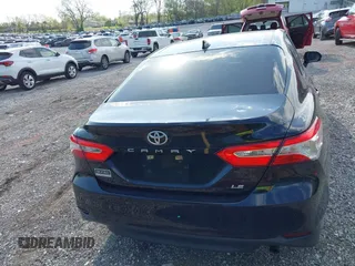 2019 Toyota Camry LE with VIN 4T1B11HK1KU718374, listed as a IAAI auction lot 42071905 with 86,460 mi miles and . Bid and sale history available at DreamBid. Image 16.