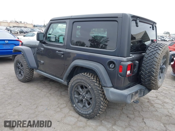 2022 Jeep Wrangler Willys Sport with VIN 1C4GJXAN7NW252931, listed as a IAAI auction lot 40972143 with 12,823 mi miles and . Bid and sale history available at DreamBid. Image 3.