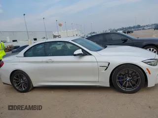 2018 BMW M4 with VIN WBS4Z9C55JED30963, listed as a IAAI auction lot 41641751 with 34,543 mi miles and . Bid and sale history available at DreamBid. Image 13.