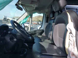 2021 Ram ProMaster Cargo with VIN 3C6LRVBG6ME513686, listed as a IAAI auction lot 41675654 with 76,989 mi miles. Bid and sale history available at carsss.com. Image 5.