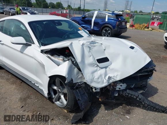 2021 Ford Mustang EcoBoost with VIN 1FA6P8THXM5153232, listed as a IAAI auction lot 42458757 with 45,267 mi miles and . Bid and sale history available at DreamBid. Image 6.