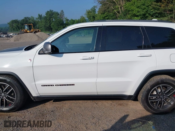 2017 Jeep Grand Cherokee Trailhawk with VIN 1C4RJFLG2HC670868, listed as a IAAI auction lot 42711041 with 129,465 mi miles and . Bid and sale history available at DreamBid. Image 14.