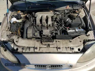1999 Mercury Sable LS z VIN 1MEFM53S7XG602788, wystawiony jako Copart lot #76894294 z przebiegiem 186 315 mil mil oraz Szkody całkowita. Historia ofert i sprzedaży dostępna na DreamBid. Obrazek 13.