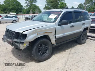 2002 Jeep Grand Cherokee Laredo with VIN 1J4GX48S32C288387, listed as a IAAI auction lot 42212249 with 151,028 mi miles and . Bid and sale history available at DreamBid. Image 2.