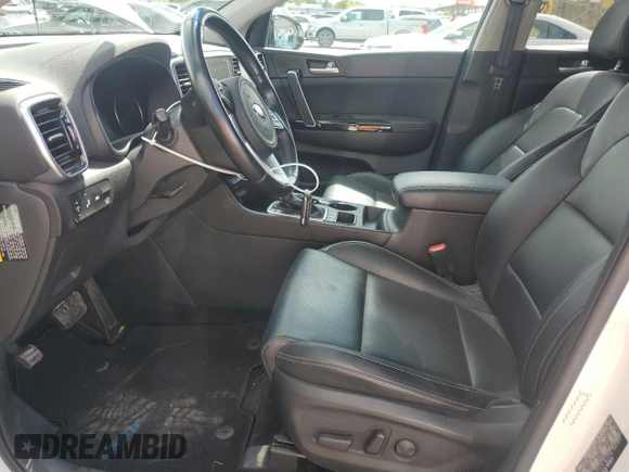 2020 Kia Sportage EX with VIN KNDPNCAC5L7833623, listed as a Copart auction lot 56111115 with 81,212 mi miles and Salvage title. Bid and sale history available at DreamBid. Image 7.
