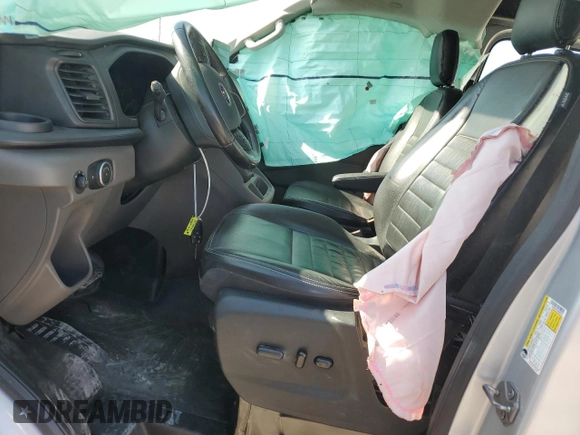2020 Ford Transit Cargo с VIN 1FTBW2YG4LKB69516, выставлен на аукционе Copart как лот 75314754 с пробегом 124 398 миль миль и Списание • Salvage title. История ставок и продаж доступна на DreamBid. Изображение 7.
