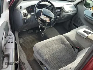 1999 Ford F-150 XL with VIN 1FTRX17LXXNA05552, listed as a Copart auction lot 60047025 with 193,122 mi miles and Salvage title. Bid and sale history available at DreamBid. Image 8.