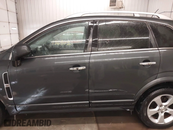 2015 Chevrolet Captiva Sport LTZ with VIN 3GNAL4EK2FS530864, listed as a IAAI auction lot 41585277 with 136,873 mi miles and . Bid and sale history available at DreamBid. Image 14.