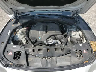 2014 BMW 7 Series 740Li with VIN WBAYE4C59ED137938, listed as a Copart auction lot 55281005 with 146,659 mi miles and Salvage Title. Bid and sale history available at carsss.com. Image 11.