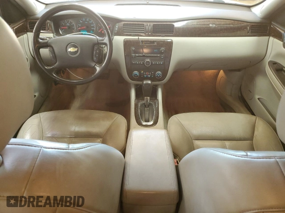 2012 Chevrolet Impala LTZ with VIN 2G1WC5E3XC1102909, listed as a Copart auction lot 52786605 with 185,134 mi miles and Salvage Title. Bid and sale history available at DreamBid. Image 8.