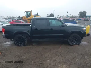 2017 Toyota Tacoma SR5 with VIN 5TFAZ5CN2HX040954, listed as a IAAI auction lot 41733137 with 97,780 mi miles and . Bid and sale history available at DreamBid. Image 13.