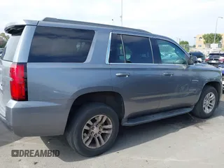 2018 Chevrolet Tahoe LS with VIN 1GNSCAEC2JR306131, listed as a IAAI auction lot 42338873 with 107,652 mi miles and . Bid and sale history available at DreamBid. Image 13.