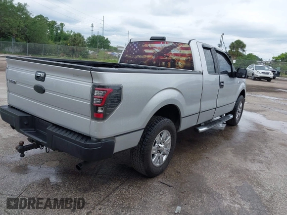 2009 Ford F-150 STX with VIN 1FTRX12859FA89537, listed as a IAAI auction lot 41907796 with 381,603 mi miles. Bid and sale history available at carsss.com. Image 4.