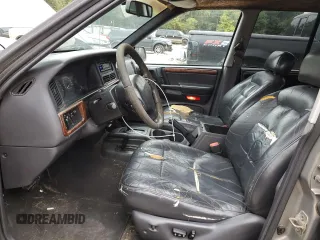 1997 Jeep Grand Cherokee Limited with VIN 1J4GZ78Y0VC599554, listed as a Copart auction lot 72006854 with 321,283 mi miles and Salvage Title. Bid and sale history available at carsss.com. Image 7.